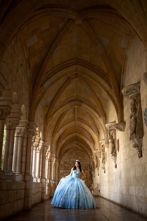 Quincea&ntilde;era photoshoot &mdash; blue gown gothic colonnade at The Ancient Spanish Monastery, Miami Visions Photography