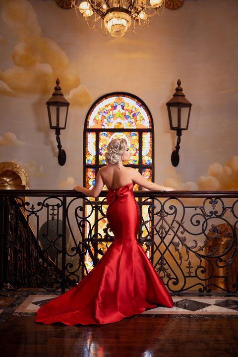 Quincea&ntilde;era photoshoot &mdash; red mermaid dress stained glass railing at The Cruz Building, Miami Visions Photography