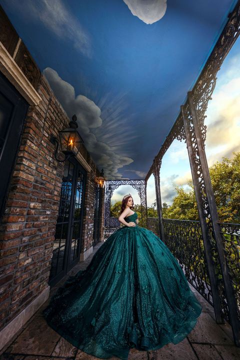 Quincea&ntilde;era photoshoot &mdash; emerald gown iron balcony at The Cruz Building, Miami Visions Photography