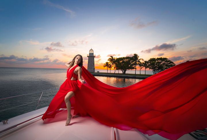 Quincea&ntilde;era photoshoot &mdash; red dress lighthouse sunset at Key Biscayne, Miami Visions Photography