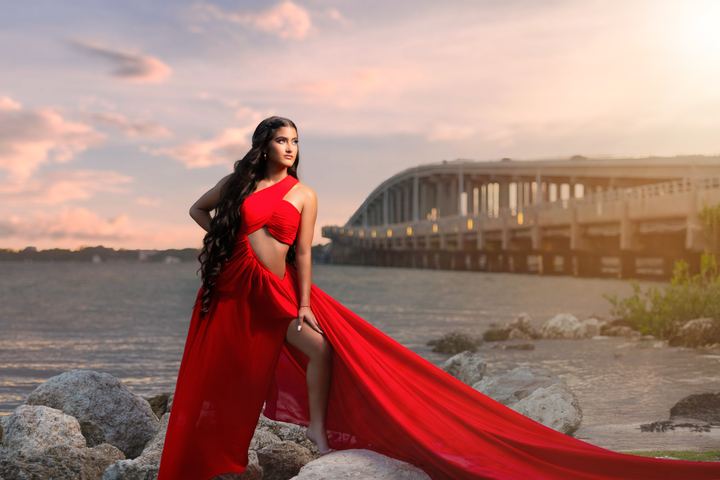 Quincea&ntilde;era photoshoot &mdash; red flying dress bridge sunset at Key Biscayne, Miami Visions Photography