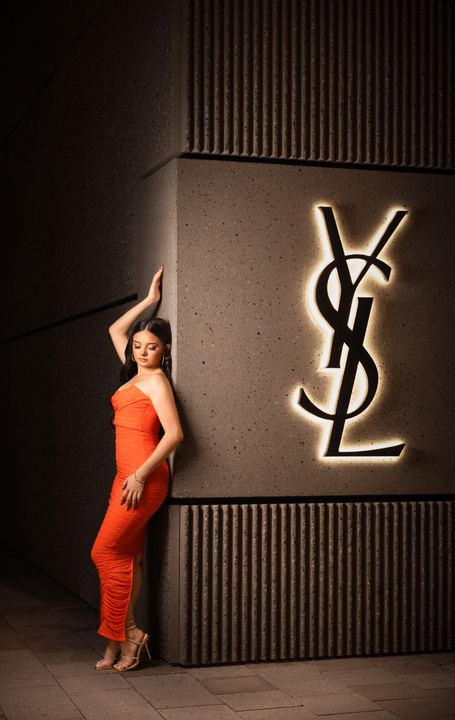 Quincea&ntilde;era photoshoot &mdash; orange dress fashion wall at Miami Design District, Miami Visions Photography