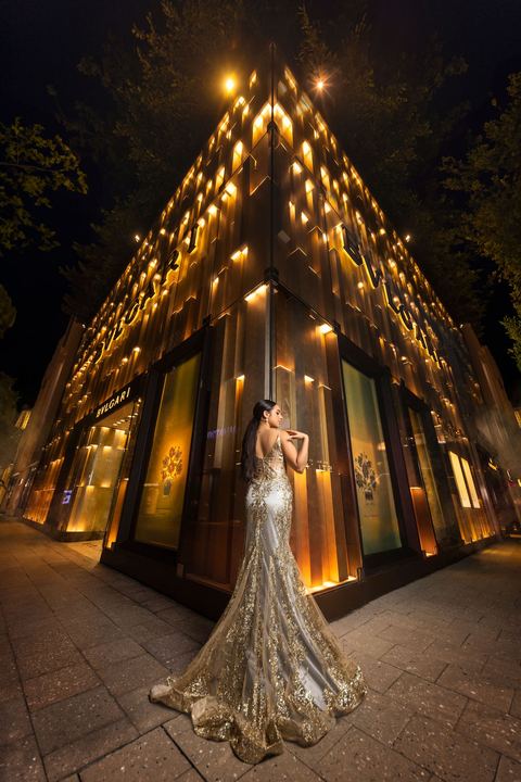 Quincea&ntilde;era photoshoot &mdash; gold beaded gown lit facade at Miami Design District, Miami Visions Photography