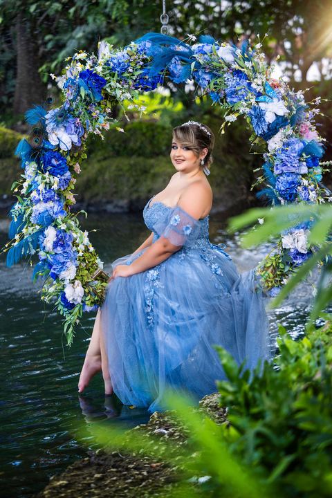 Quincea&ntilde;era photoshoot &mdash; blue floral swing lagoon at Secret Gardens Miami, Miami Visions Photography