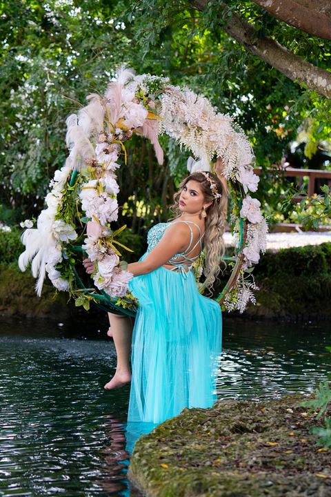 Quincea&ntilde;era photoshoot &mdash; turquoise gown feather floral ring at Secret Gardens Miami, Miami Visions Photography
