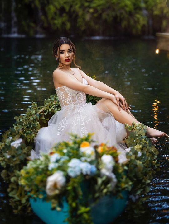 Quincea&ntilde;era photoshoot &mdash; white lace gown lagoon flowers at Secret Gardens Miami, Miami Visions Photography