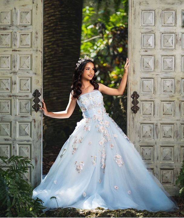 Quincea&ntilde;era photoshoot &mdash; white gown carved doors at Secret Gardens Miami, Miami Visions Photography