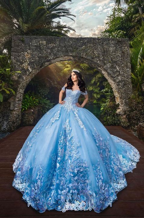 Quincea&ntilde;era photoshoot &mdash; blue lace ball gown garden arch at Secret Gardens Miami, Miami Visions Photography