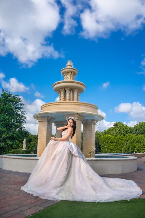 Quincea&ntilde;era photoshoot &mdash; silver gown stone fountain at Villa Toscana Miami, Miami Visions Photography