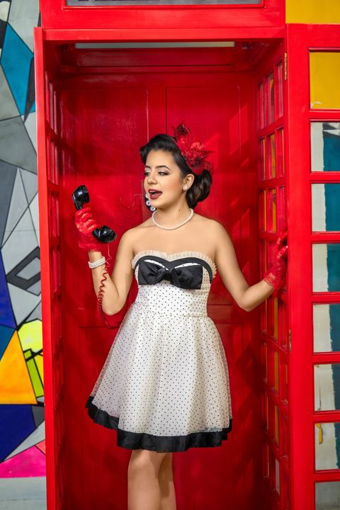 Quincea&ntilde;era photoshoot &mdash; polka dot dress red phone booth retro at Villa Toscana Miami, Miami Visions Photography