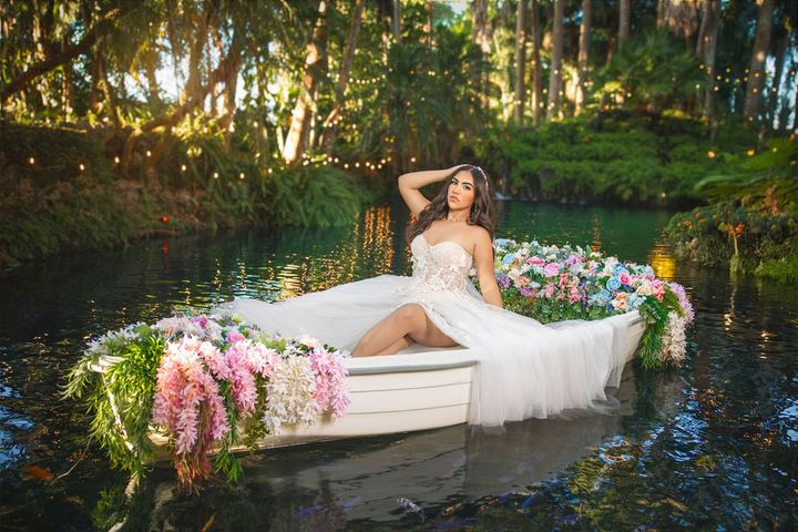 Quincea&ntilde;era photoshoot &mdash; white gown flower boat at Villa Turqueza, Miami Visions Photography