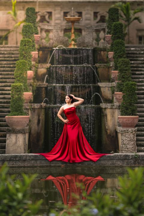 Quincea&ntilde;era photoshoot &mdash; red mermaid dress cascade fountain at Vizcaya Museum & Gardens, Miami Visions Photography