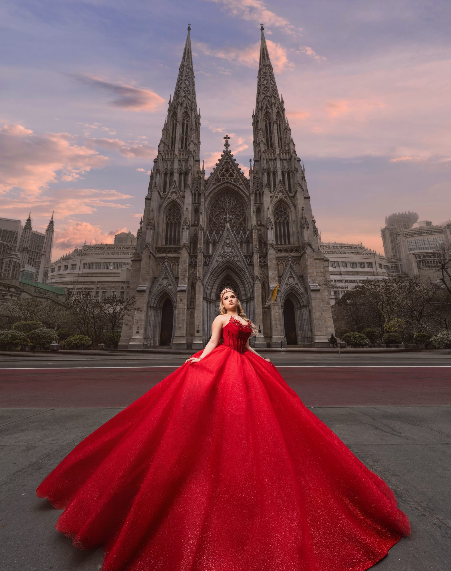 Quinceañera in a red ball gown outside a Gothic cathedral — Miami Visions Photography