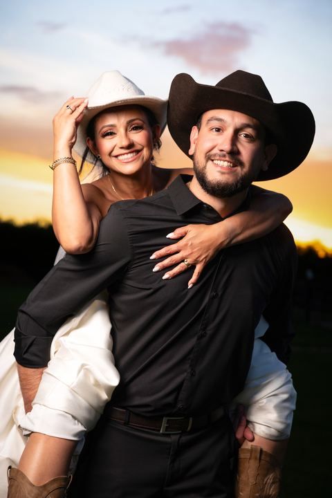 Bride groom cowboy hats smiling &mdash; wedding photography by Miami Visions, Miami