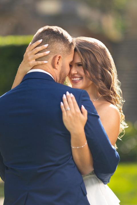 Bride smiling with groom, first look, Miami wedding photography