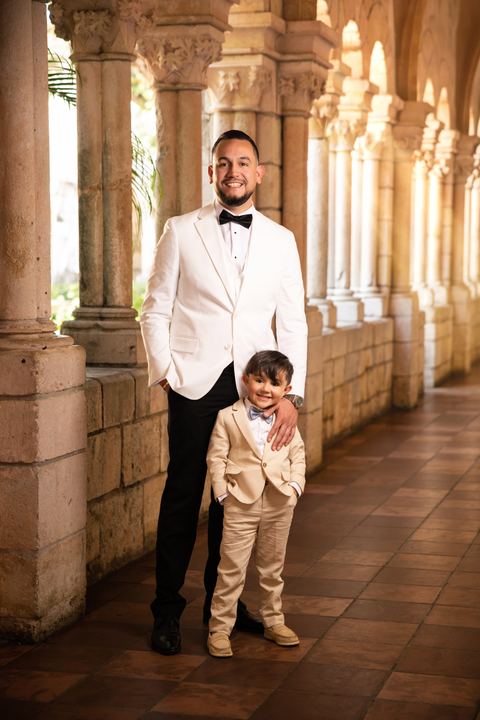 Groom son white tux monastery cloister &mdash; wedding photography by Miami Visions, Miami