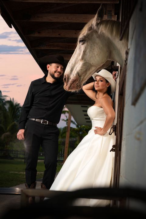 Bride groom white horse stable sunset &mdash; wedding photography by Miami Visions, Miami