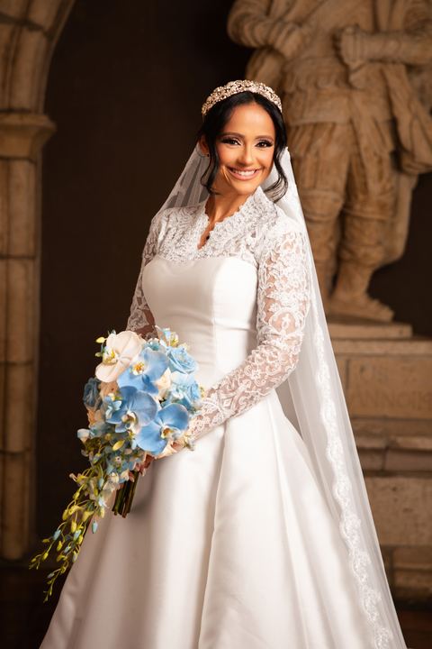 Bride lace sleeves blue orchid bouquet &mdash; wedding photography by Miami Visions, Miami