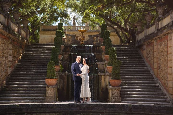 Bride and groom at Vizcaya waterfall staircase, Miami wedding photographer