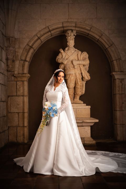 Bride blue bouquet monastery statue &mdash; wedding photography by Miami Visions, Miami