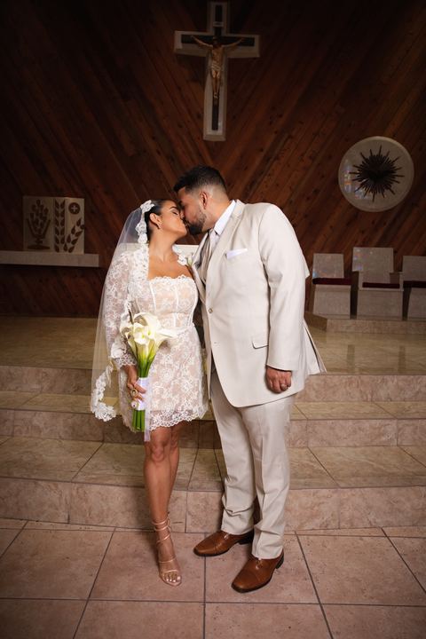 Bride groom kiss chapel altar calla lilies &mdash; wedding photography by Miami Visions, Miami